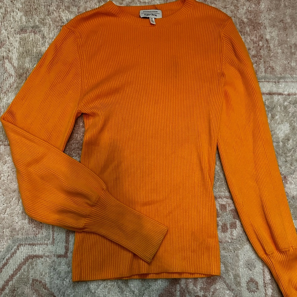 Orange crewneck sweater